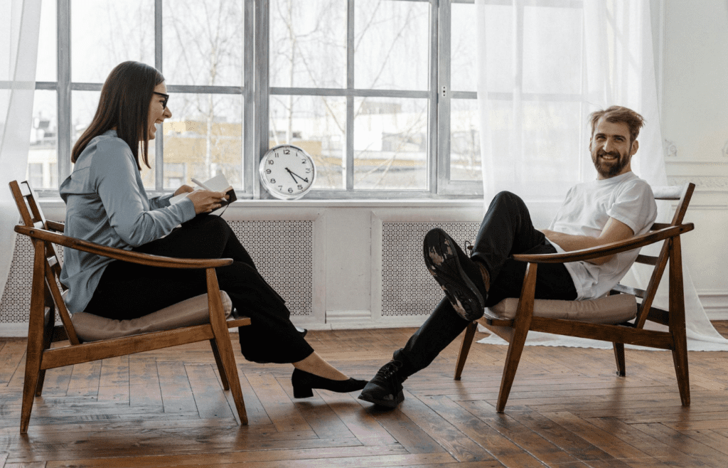 Two people practicing a conversation or role-play