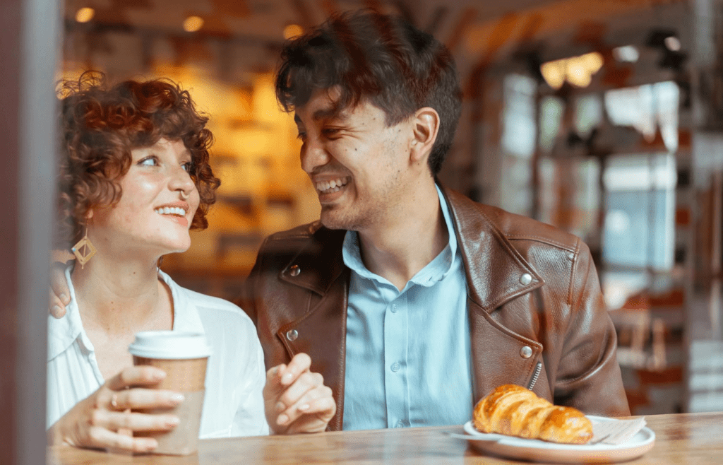 A couple talking over morning coffee