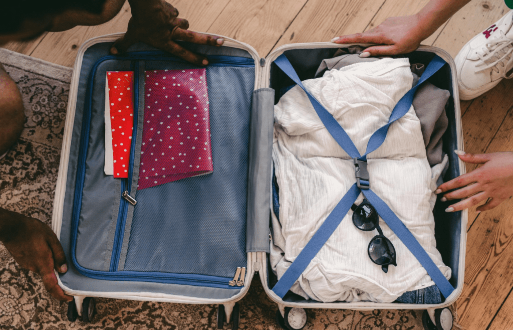 A carry-on suitcase packed neatly