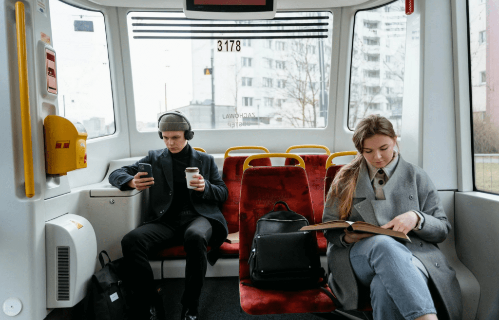 A traveler boarding a city bus or subway