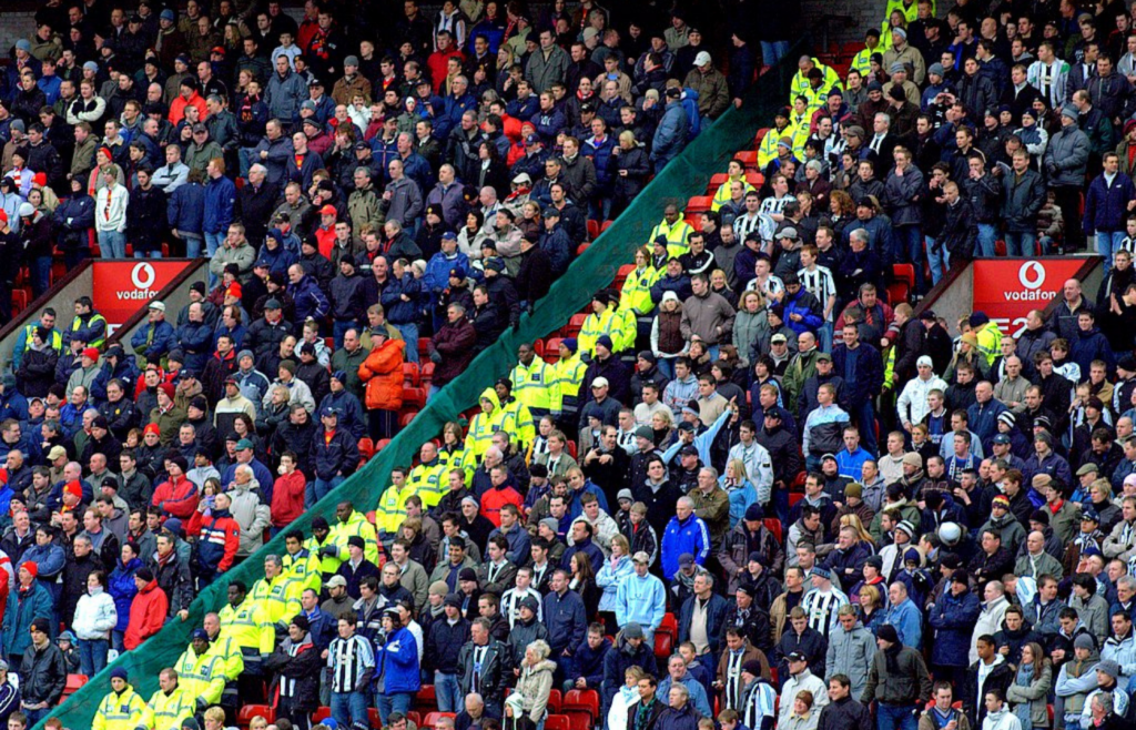 On the left - Manchester United fans (red)