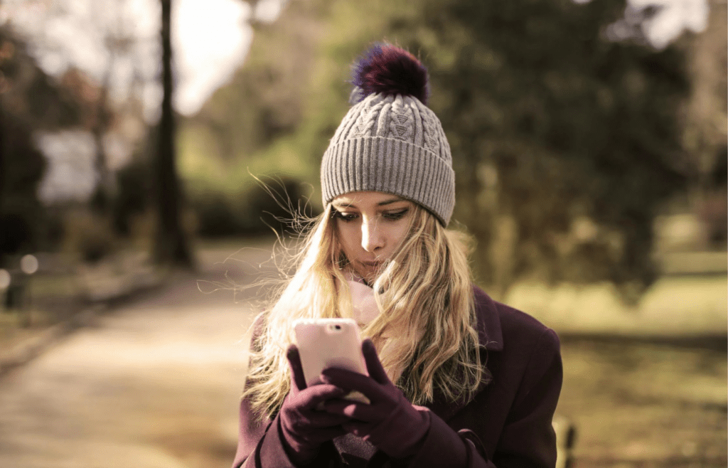 A person texting repeatedly, looking for a reply