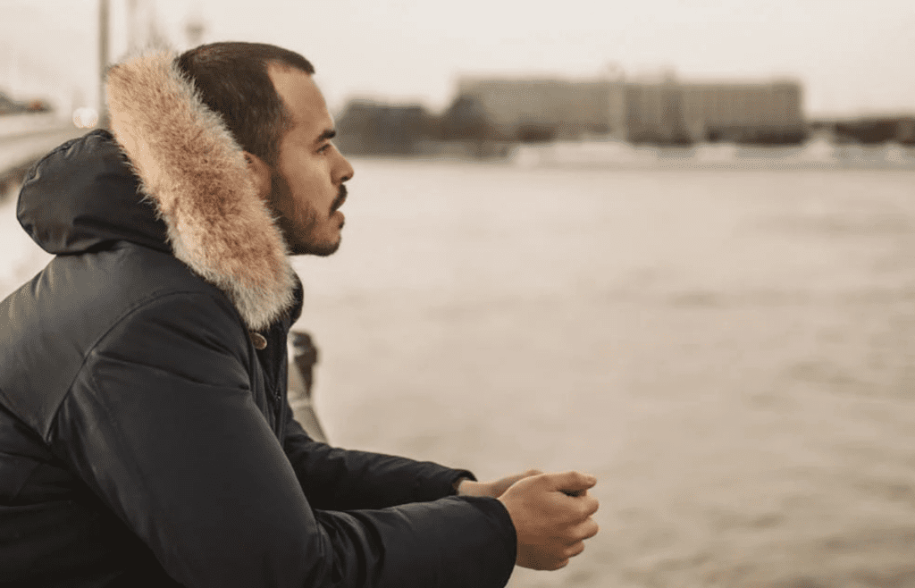A person looking away during a moment of reflection