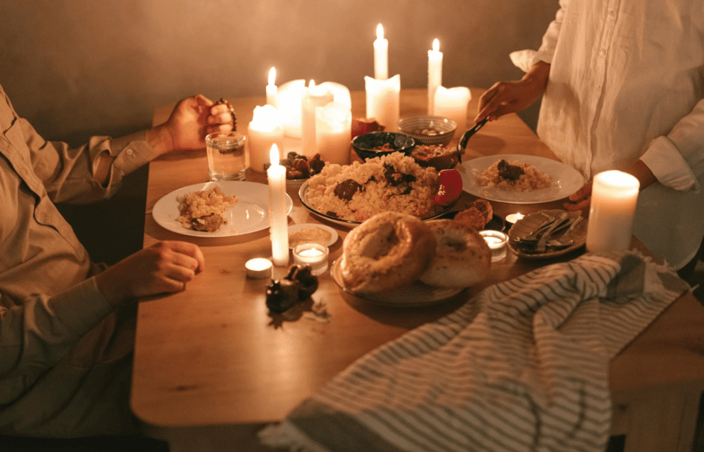 A couple dining at a fine restaurant with candlelight