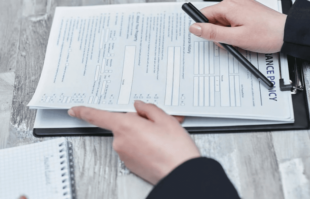 A traveler reviewing a travel insurance policy