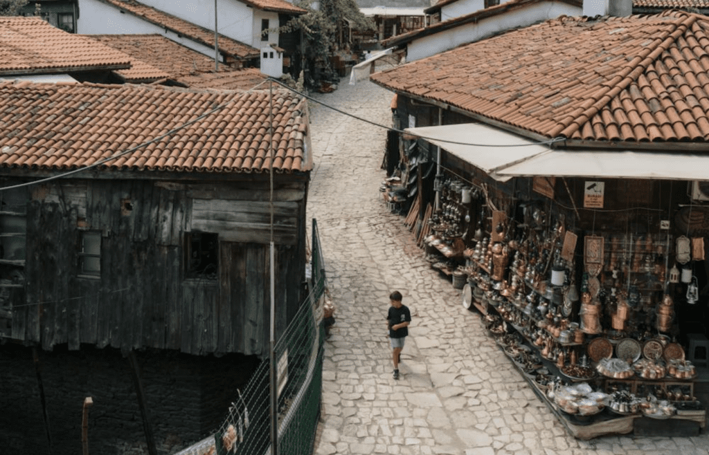 A traveler exploring a quaint nearby town