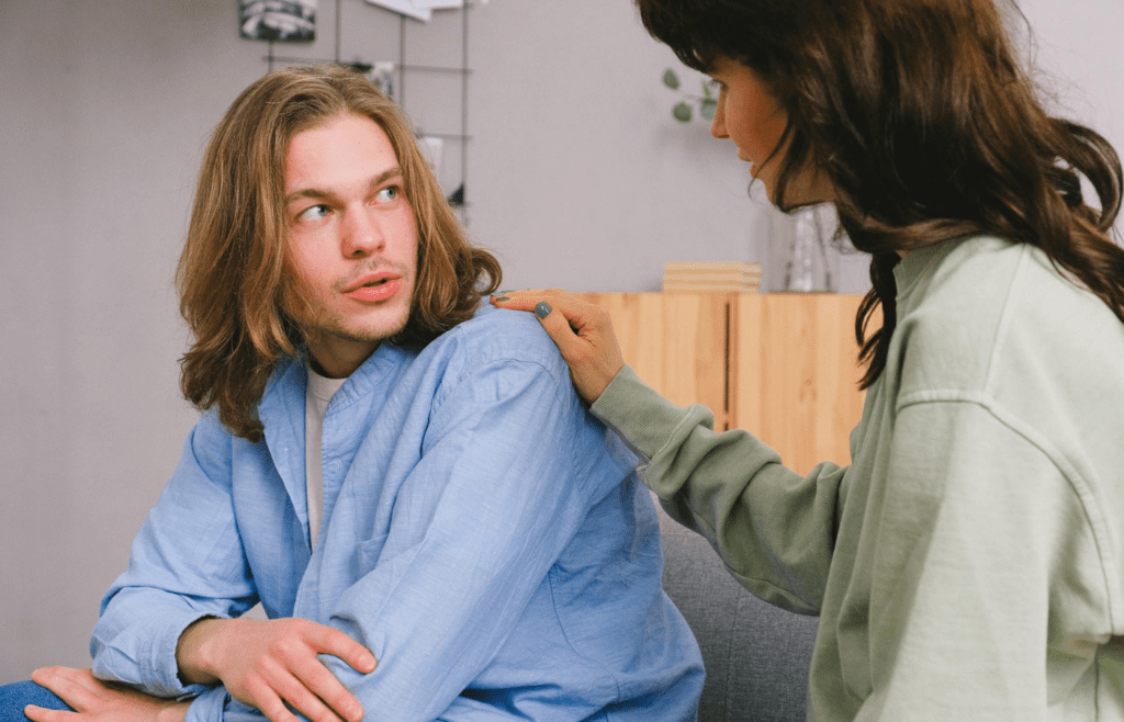 A concerned friend talking to one partner