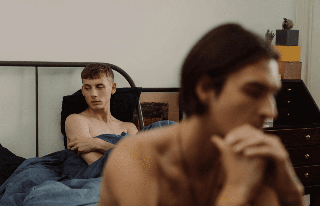A couple with distant body language in bed