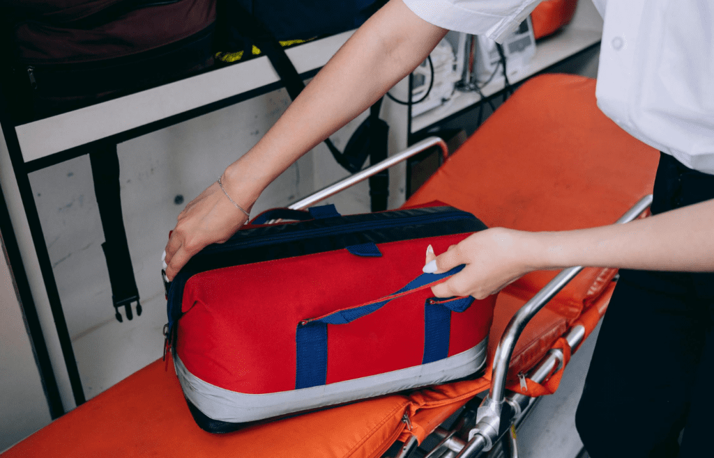 A small first-aid kit tucked inside a backpack