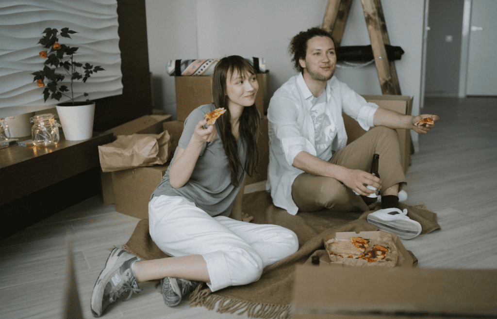 A couple eating dinner in silence