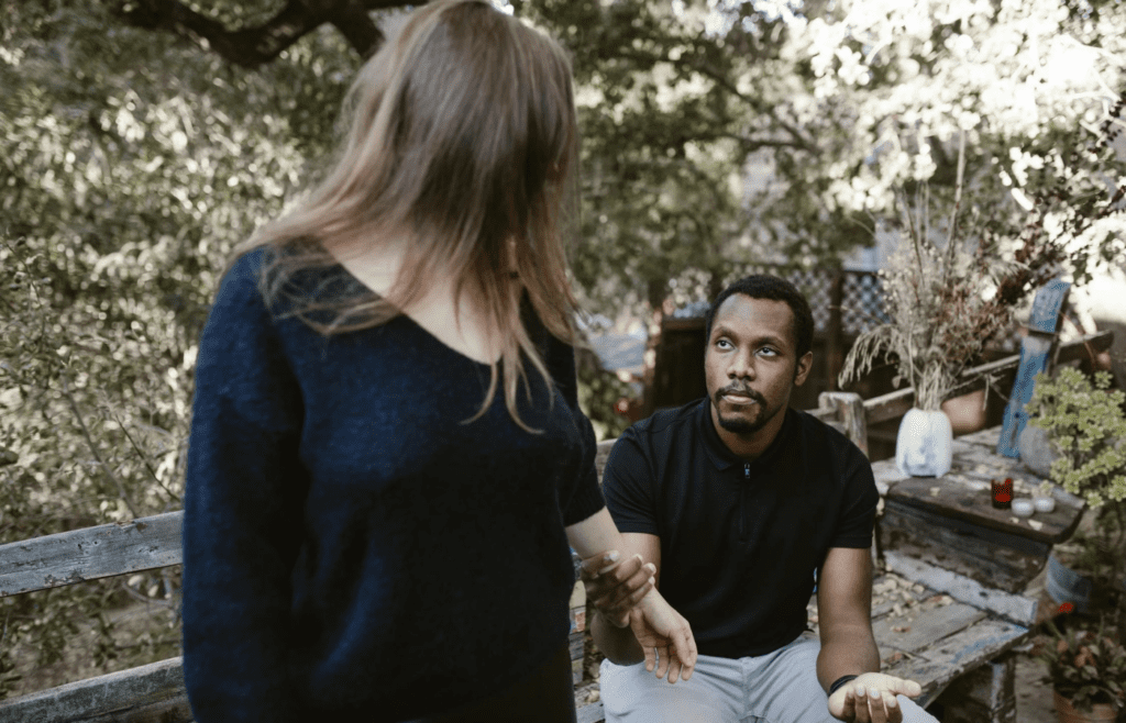 A couple looking bored during a conversation