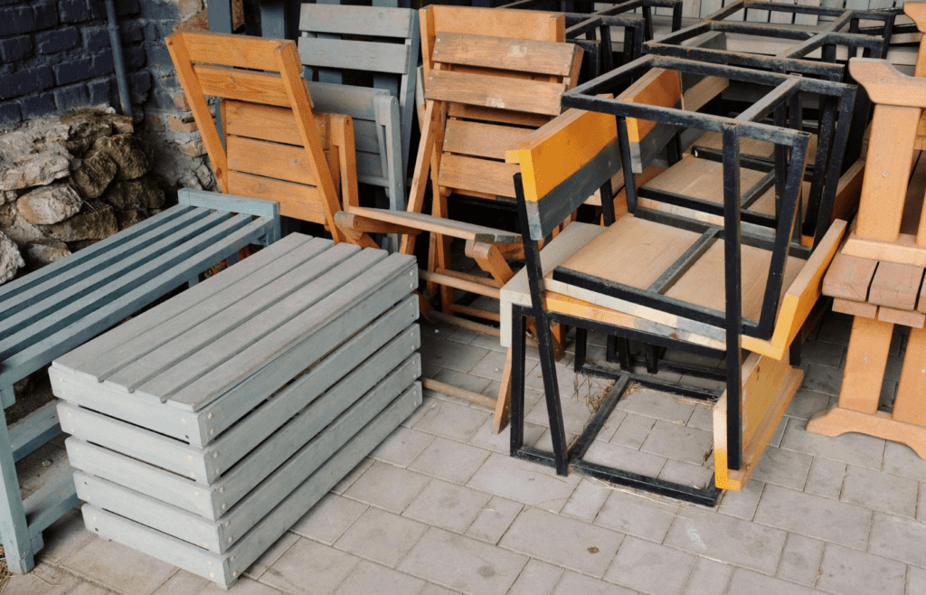 Patio furniture tied down or stacked together