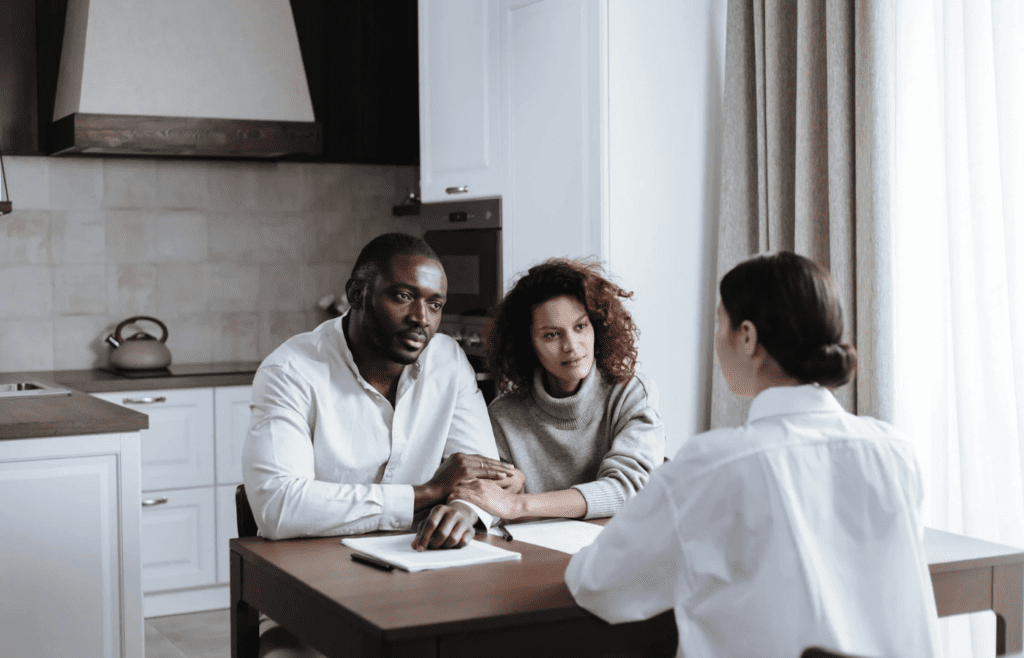 A family discussing emergency plans around a table