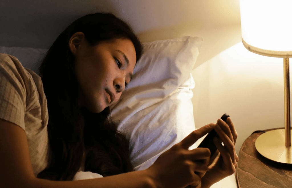 A person browsing an online store in pajamas late at night.