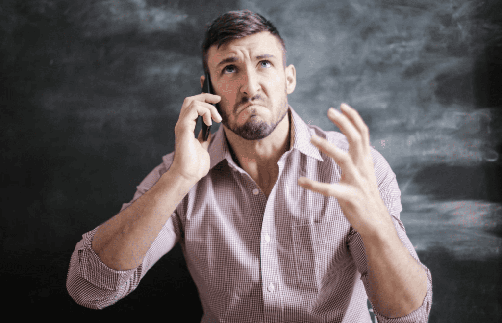 A frustrated person looking away during an argument