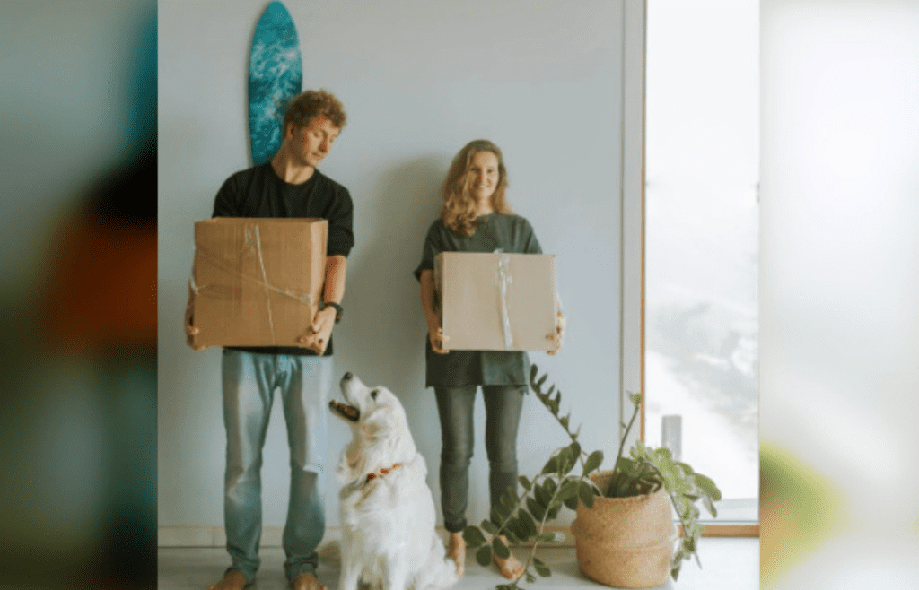 A Couple Carrying dog toy subscription box at Home