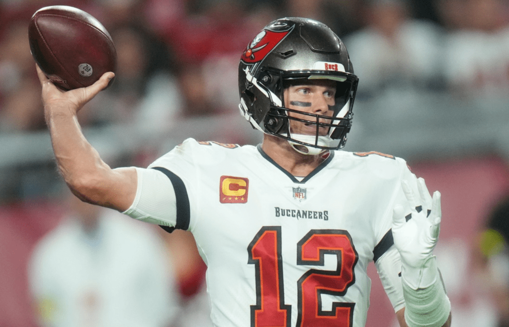 Tampa Bay Buccaneers quarterback Tom Brady (12) throws the ball against the Arizona Cardinals at State Farm Stadium in Glendale on Dec. 25, 2022.