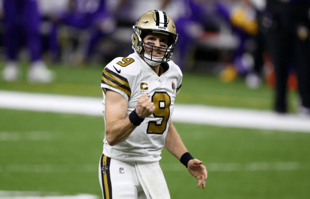 Dec 25, 2020; New Orleans, Louisiana, USA; New Orleans Saints quarterback Drew Brees (9) gestures after a touchdown run by running back Alvin Kamara (41) in the second quarter against the Minnesota Vikings at the Mercedes-Benz Superdome. Mandatory Credit: Chuck Cook-Imagn Images