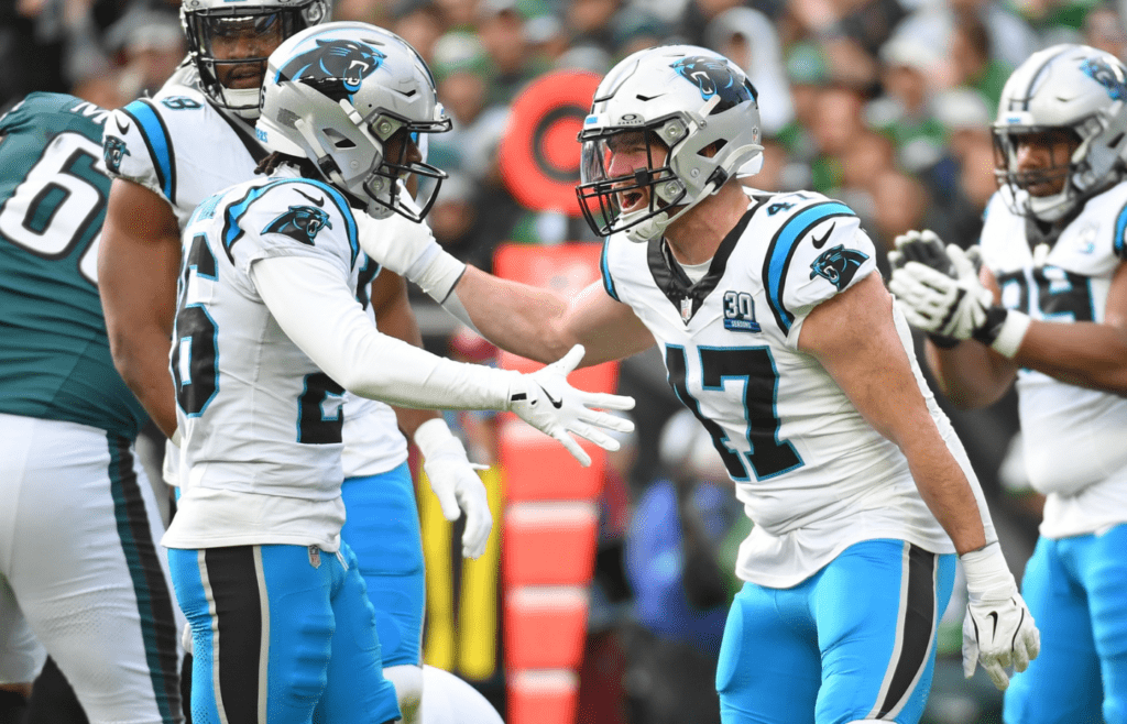 Dec 8, 2024; Philadelphia, Pennsylvania, USA; Carolina Panthers linebacker Josey Jewell (47) celebrates a sack with cornerback Chau Smith-Wade (26) against the Philadelphia Eagles at Lincoln Financial Field. Mandatory Credit: Eric Hartline-Imagn Images