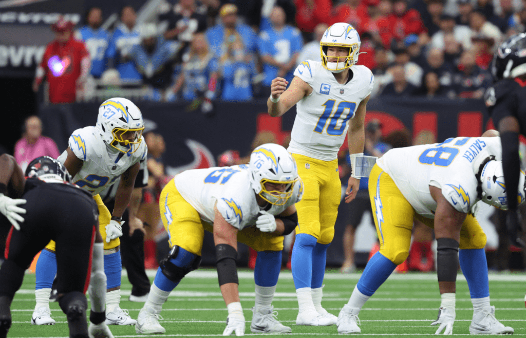 Jan 11, 2025; Houston, Texas, USA; Los Angeles Chargers quarterback Justin Herbert (10) during the second quarter against the Houston Texans in an AFC wild card game at NRG Stadium. Mandatory Credit: Troy Taormina-Imagn Images