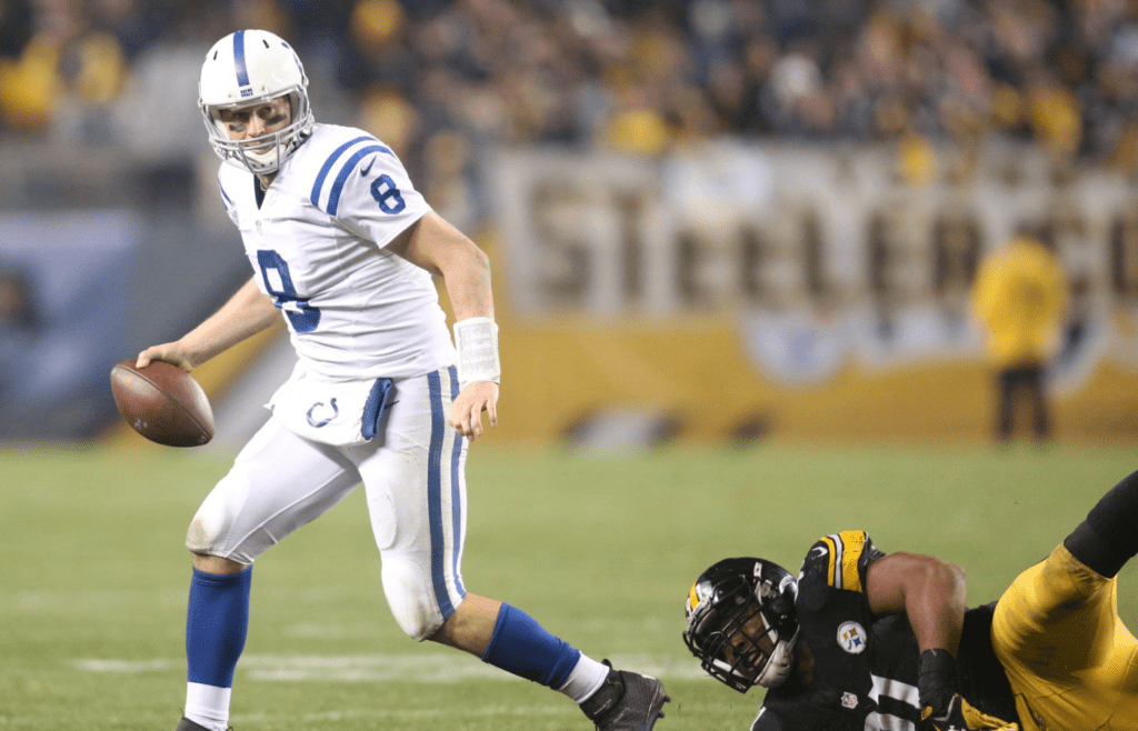 Dec 6, 2015; Pittsburgh, PA, USA; Indianapolis Colts quarterback Matt Hasselbeck (8) scrambles away from Pittsburgh Steelers defensive end Stephon Tuitt (91) during the third quarter at Heinz Field. The Steelers won 45-10. Mandatory Credit: Charles LeClaire-Imagn Images