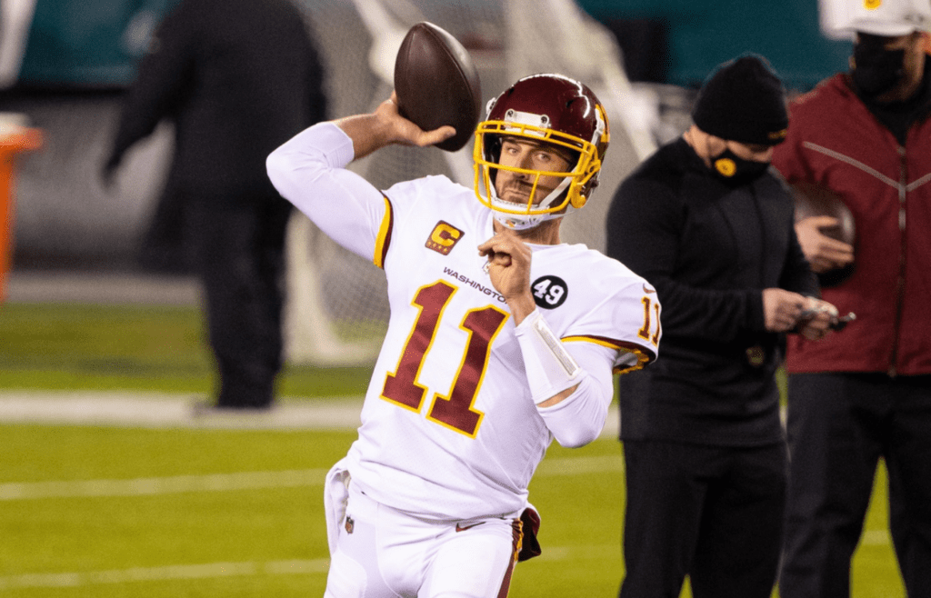 Jan 3, 2021; Philadelphia, Pennsylvania, USA; Washington Football Team quarterback Alex Smith (11) warms up before a game against the Philadelphia Eagles at Lincoln Financial Field. Mandatory Credit: Bill Streicher-Imagn Images