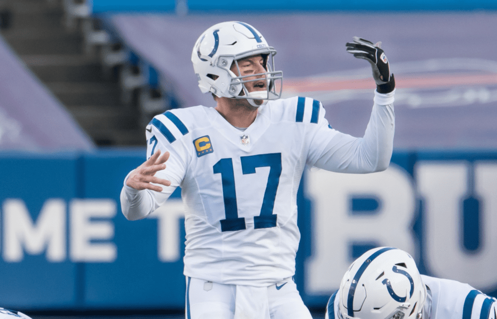 Jan 9, 2021; Orchard Park, New York, USA; Indianapolis Colts quarterback Philip Rivers (17) makes an adjustment at the line of scrimmage in the third quarter wildcard playoff game against the Buffalo Bills at Bills Stadium. Mandatory Credit: Mark Konezny-Imagn Images