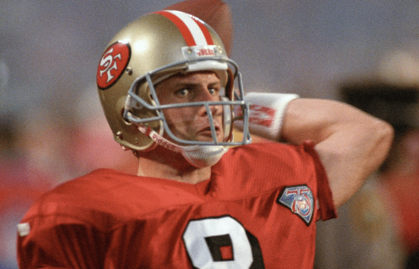 San Francisco 49ers quarterback Steve Young (8) throws a pass during warm-ups after halftime for the game against the San Diego Chargers during Super Bowl XXIX at the Joe Robbie Stadium. The 49ers beat the Chargers 49-26.
