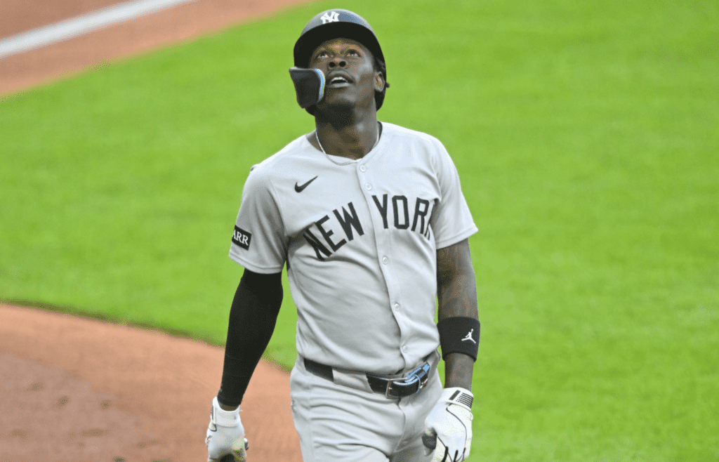 Apr 22, 2025; Cleveland, Ohio, USA; New York Yankees second baseman Jazz Chisholm Jr. (13) reacts after he was hit by a foul ball in the fourth inning against the Cleveland Guardians at Progressive Field. Mandatory Credit: David Richard-Imagn Images