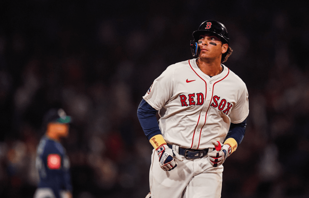 Apr 22, 2025; Boston, Massachusetts, USA; Boston Red Sox first base Triston Casas (36) hits a three run home run against the Seattle Mariners in the seventh inning at Fenway Park. Mandatory Credit: David Butler II-Imagn Images