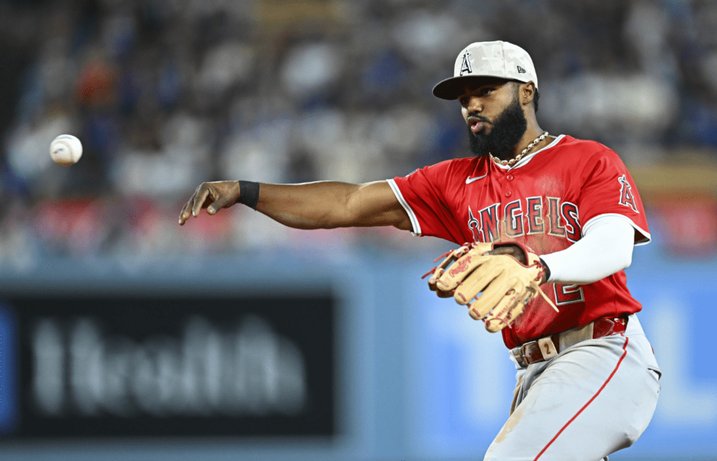 May 17, 2025; Los Angeles, California, USA; Los Angeles Angels second baseman Luis Rengifo (2) fields a ball against the Los Angeles Dodgers during the eighth inning at Dodger Stadium. Mandatory Credit: Jonathan Hui-Imagn Images
