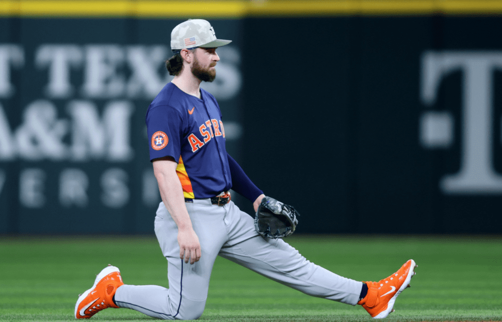 May 18, 2025; Arlington, Texas, USA; Houston Astros second base Brendan Rodgers (1) kneels during a timeout in the the game against the Texas Rangers at Globe Life Field. Mandatory Credit: Tim Heitman-Imagn Images