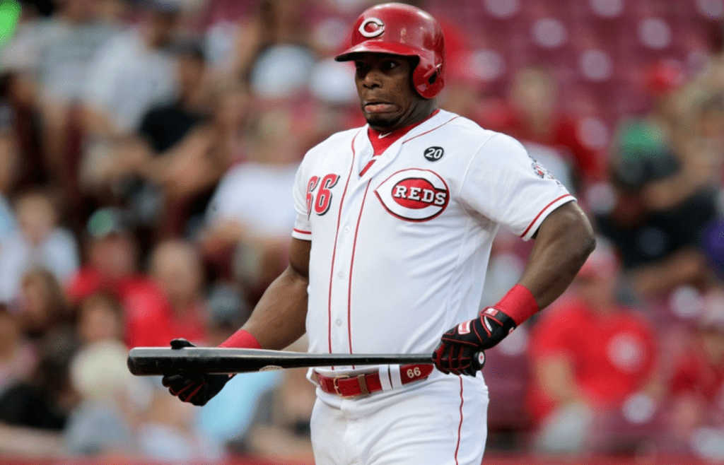 Cincinnati Reds right fielder Yasiel Puig (66) reacts after a pitch in the first inning of an MLB baseball game against the Colorado Rockies, Friday, July 26, 2019, at Great American Ball Park in Cincinnati. Colorado Rockies At Cincinnati Reds July 26