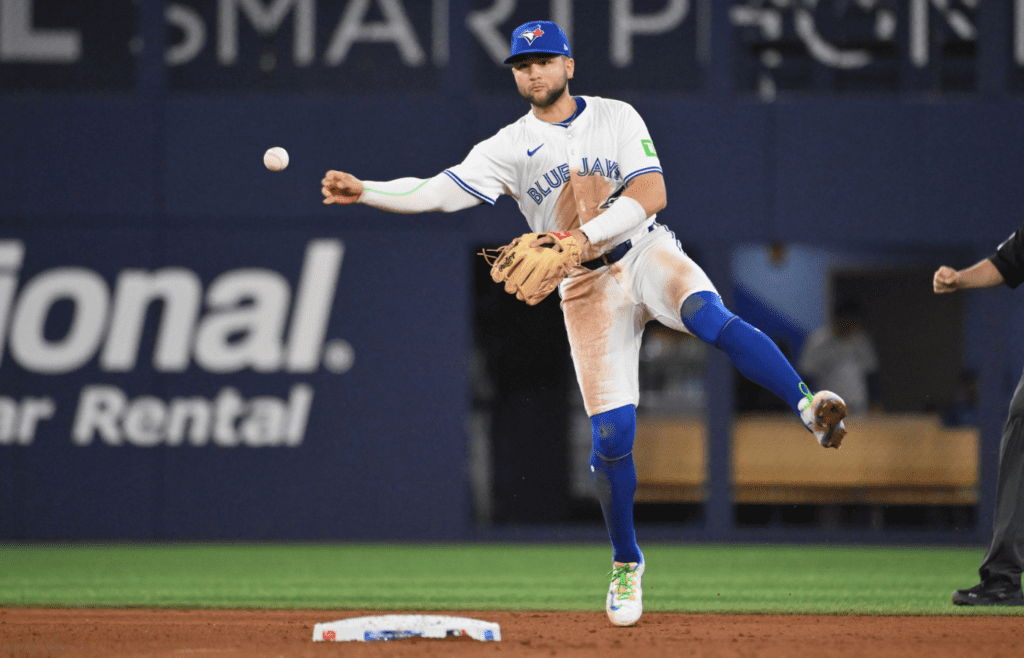 May 14, 2025; Toronto, Ontario, CAN; Toronto Blue Jays shortstop Bo Bichette (11) throws out Tampa Bay Rays left fielder Chandler Simpson (not shown) in the fifth inning at Rogers Centre. Mandatory Credit: Dan Hamilton-Imagn Images