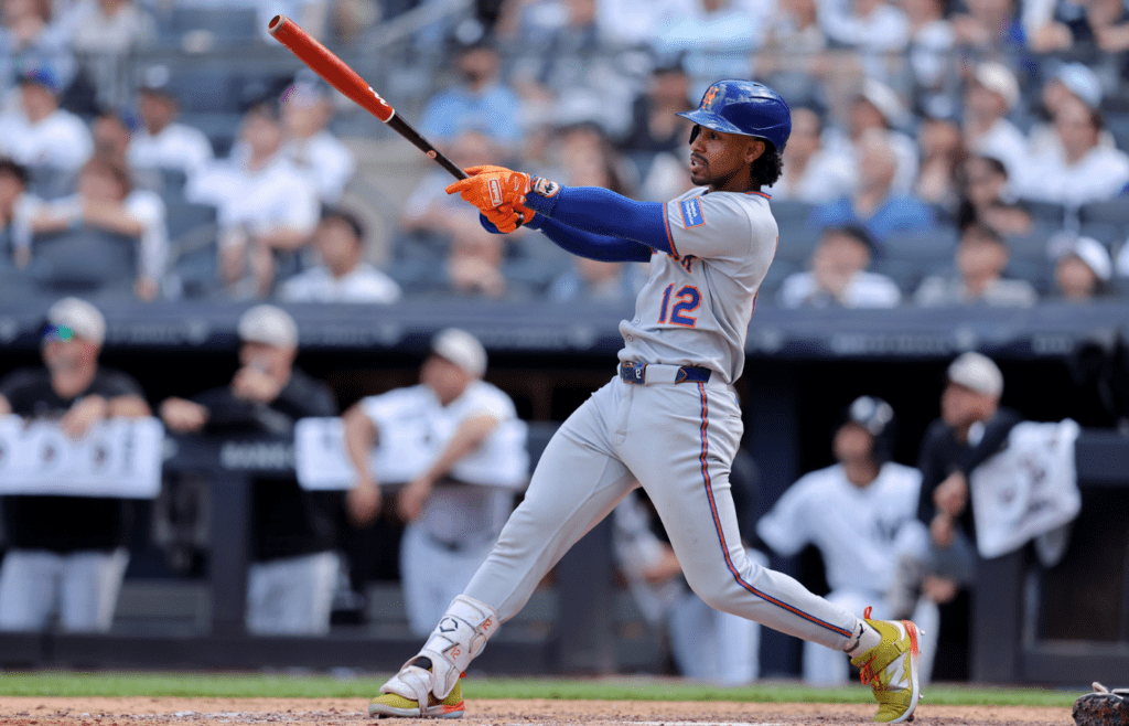 May 17, 2025; Bronx, New York, USA; New York Mets shortstop Francisco Lindor (12) watches his game winning RBI sacrifice fly against the New York Yankees during the ninth inning at Yankee Stadium. Mandatory Credit: Brad Penner-Imagn Images