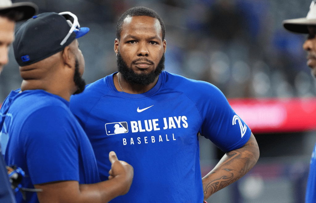 May 18, 2025; Toronto, Ontario, CAN; Toronto Blue Jays first baseman Vladimir Guerrero Jr. (27) talks with former player and assistant to the coaching staff Edwin Encarnacion during batting practice before a game against the Detroit Tigers at Rogers Centre. Mandatory Credit: Nick Turchiaro-Imagn