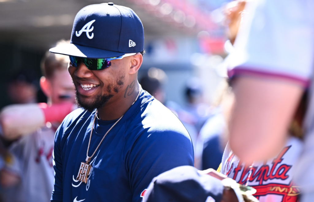 Aug 18, 2024; Anaheim, California, USA; Atlanta Braves outfielder Ronald Acuña Jr. (13) in the dugout against the Los Angeles Angels during the ninth inning at Angel Stadium. Mandatory Credit: Jonathan Hui-Imagn Images