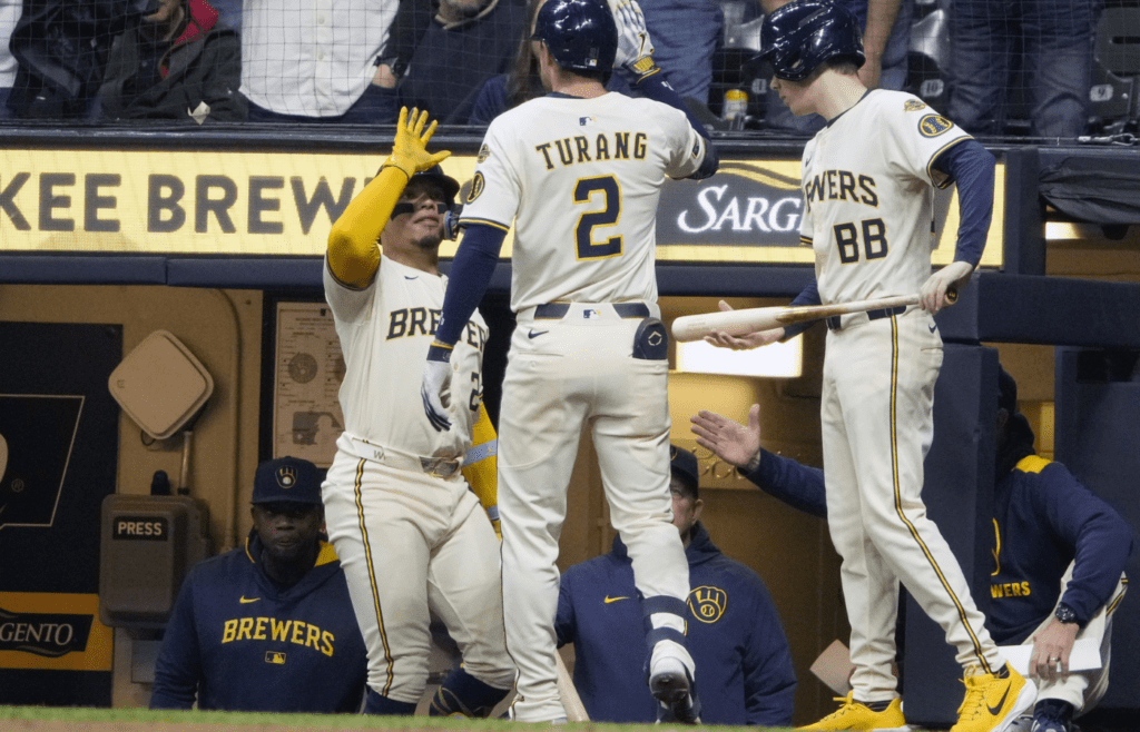 May 20, 2025; Milwaukee, Wisconsin, USA; Milwaukee Brewers second base Brice Turang (2) is congratulated by catcher William Contreras (24) after hitting home run against the Baltimore Orioles in the third inning at American Family Field. Mandatory Credit: Michael McLoone-Imagn Images