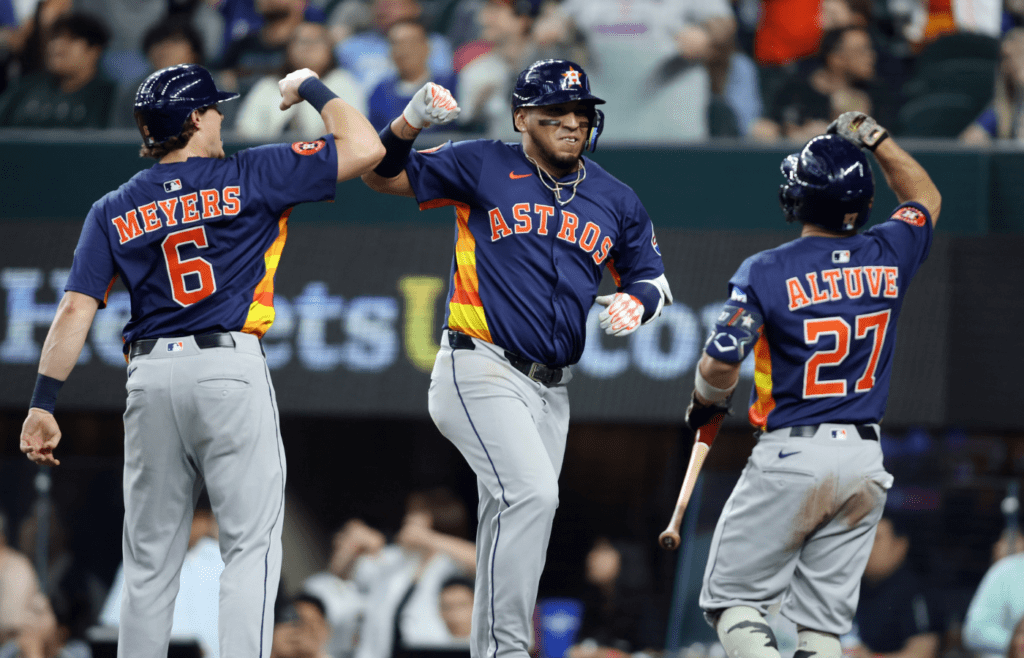 May 18, 2025; Arlington, Texas, USA; Houston Astros third base Isaac Paredes (15) is congratulated by outfielder Jake Meyers (6) and designated hitter Jose Altuve (27) after hitting a three run home run during the eighth inning against the Texas Rangers at Globe Life Field. Mandatory Credit: Tim Heitman-Imagn Images
