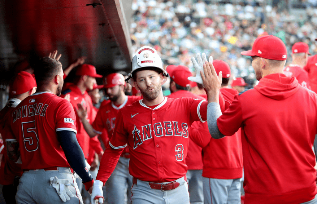 May 19, 2025; West Sacramento, California, USA; Los Angeles Angels left fielder Taylor Ward (3) celebrates with teammates after hitting a two run home run against the Athletics during the third inning at Sutter Health Park. Mandatory Credit: Dennis Lee-Imagn Images