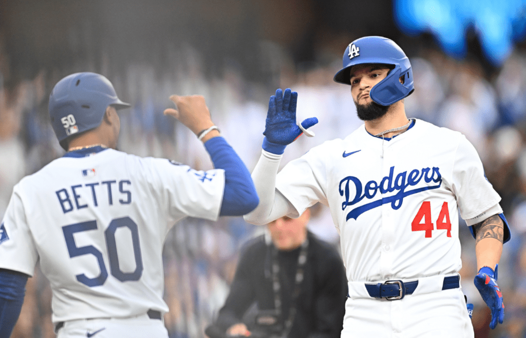 May 17, 2025; Los Angeles, California, USA; Los Angeles Dodgers outfielder Andy Pages (44) celebrates with shortstop Mookie Betts (50) after hitting a three run home run against the Los Angeles Angels in the first inning at Dodger Stadium. Mandatory Credit: Jonathan Hui-Imagn Images