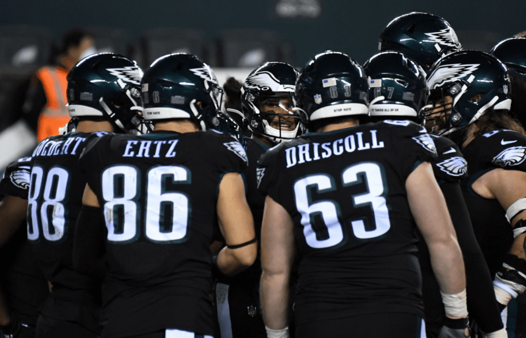 Dec 13, 2020; Philadelphia, Pennsylvania, USA; Philadelphia Eagles quarterback Jalen Hurts huddles in th second quarter against the New Orleans Saints at Lincoln Financial Field. Mandatory Credit: James Lang-Imagn Images