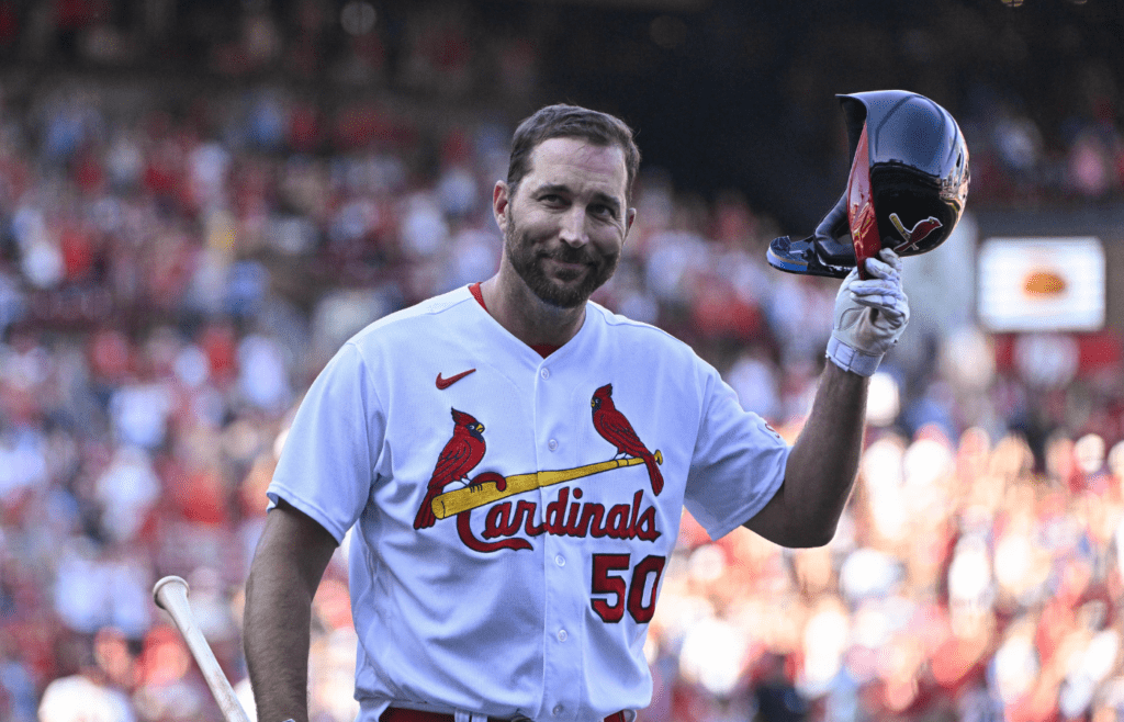 Oct 1, 2023; St. Louis, Missouri, USA; St. Louis Cardinals pinch hitter Adam Wainwright (50) tips his cap as he receives a standing ovation after his final at bat during the eighth inning against the Cincinnati Reds at Busch Stadium. Mandatory Credit: Jeff Curry-Imagn Images