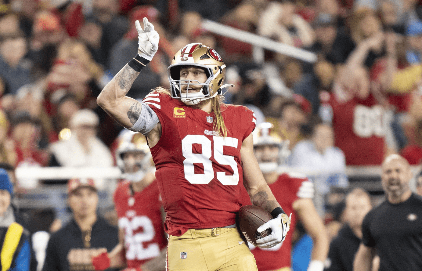 San Francisco 49ers tight end George Kittle (85) celebrates a first down against the Detroit Lions during the fourth quarter at Levi's Stadium.