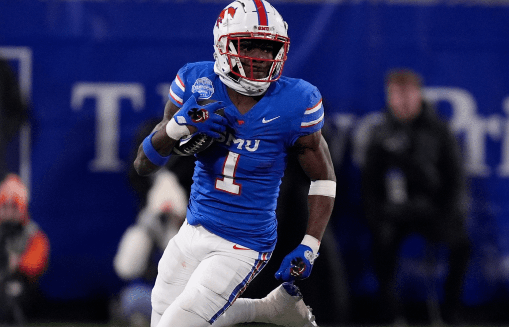 Dec 7, 2024; Charlotte, NC, USA; Southern Methodist Mustangs running back Brashard Smith (1) runs during the second quarter against the Clemson Tigers in the 2024 ACC Championship game at Bank of America Stadium. Mandatory Credit: Jim Dedmon-Imagn Images