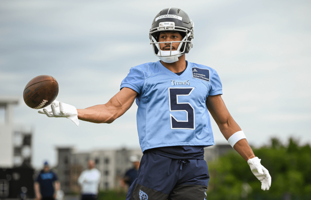 May 10, 2025; Nashville, TN, USA; Tennessee Titans wider receiver Elic Ayomanor (5) makes a catch as he goes through drills during Rookie Mini Camp at Saint Thomas Sports Park. Mandatory Credit: Steve Roberts-Imagn Images