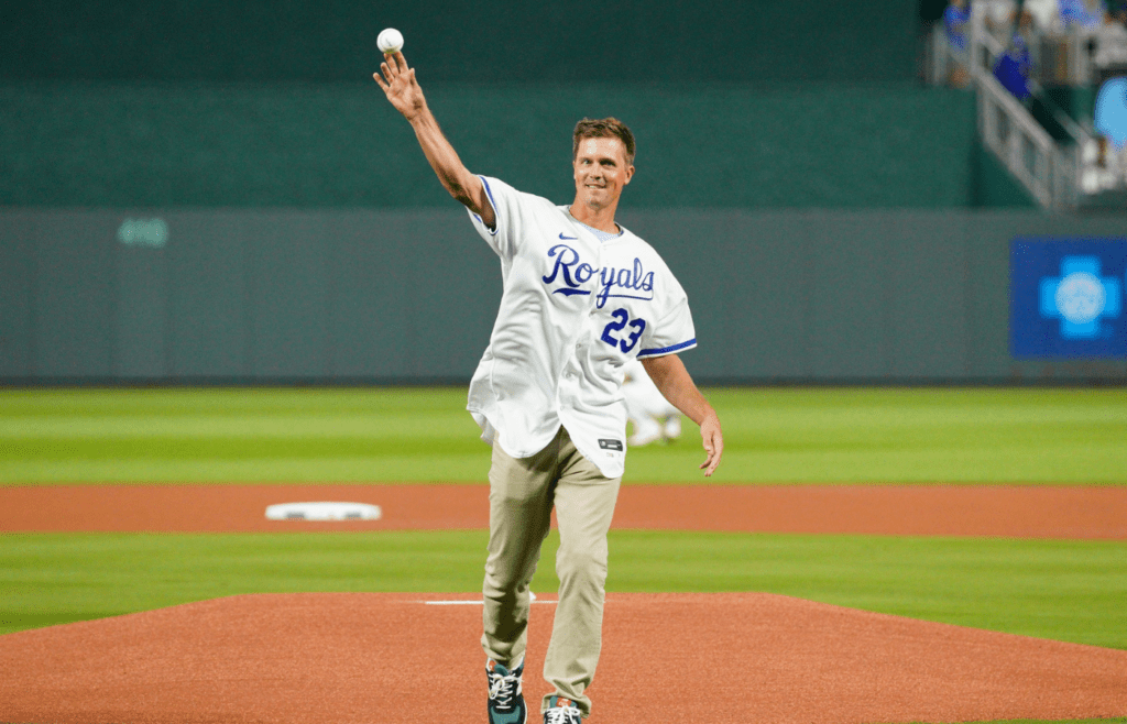 Oct 10, 2024; Kansas City, Missouri, USA; Former Kansas City Royals pitcher Zack Greinke throws out the first pitch prior to game four of the ALDS between Kansas City Royals and New York Yankees for the 2024 MLB Playoffs at Kauffman Stadium. Mandatory Credit: Denny Medley-Imagn Images