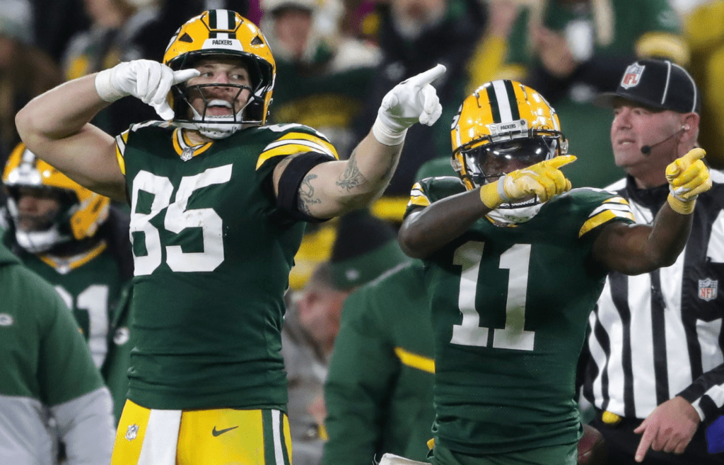 Green Bay Packers wide receiver Jayden Reed (11) reacts with tight end Tucker Kraft (85) after cathing a first down pass against the New Orleans Saints on Monday, December 23, 2024 at Lambeau Field in Green Bay, Wis. The Packers defeated the Saints 34-0. Wm. Glasheen USA TODAY NETWORK-Wisconsin