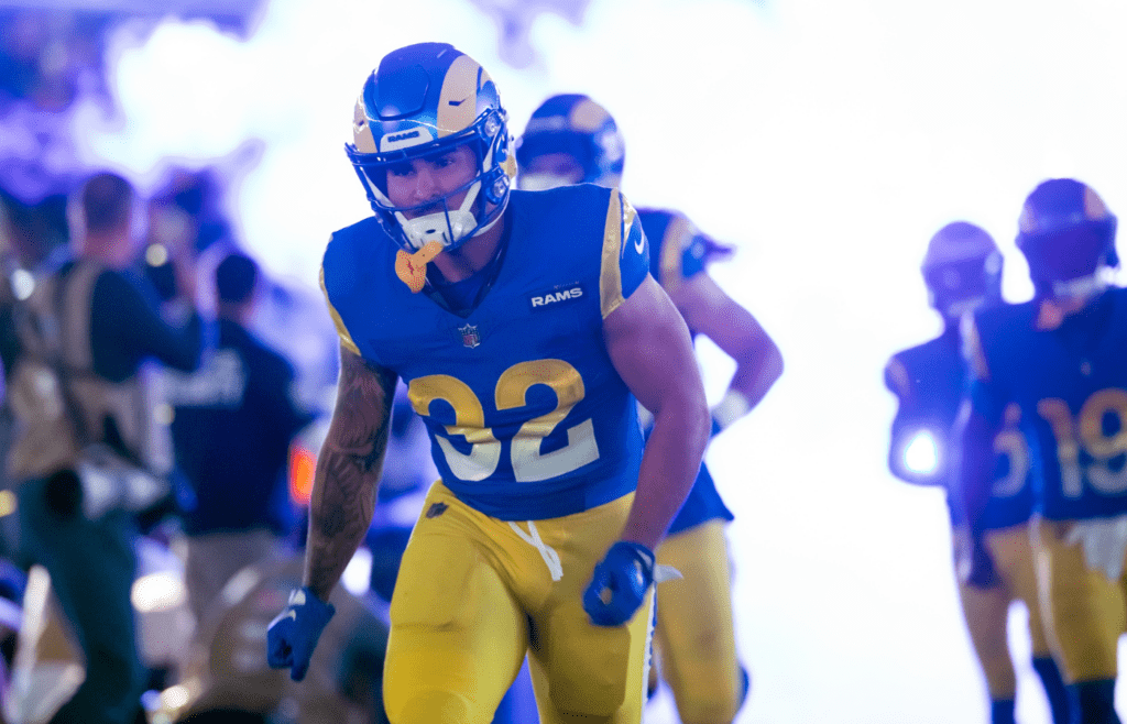 Jan 13, 2025; Glendale, AZ, USA; Los Angeles Rams running back Cody Schrader (32) against the Minnesota Vikings during an NFC wild card game at State Farm Stadium. Mandatory Credit: Mark J. Rebilas-Imagn Images