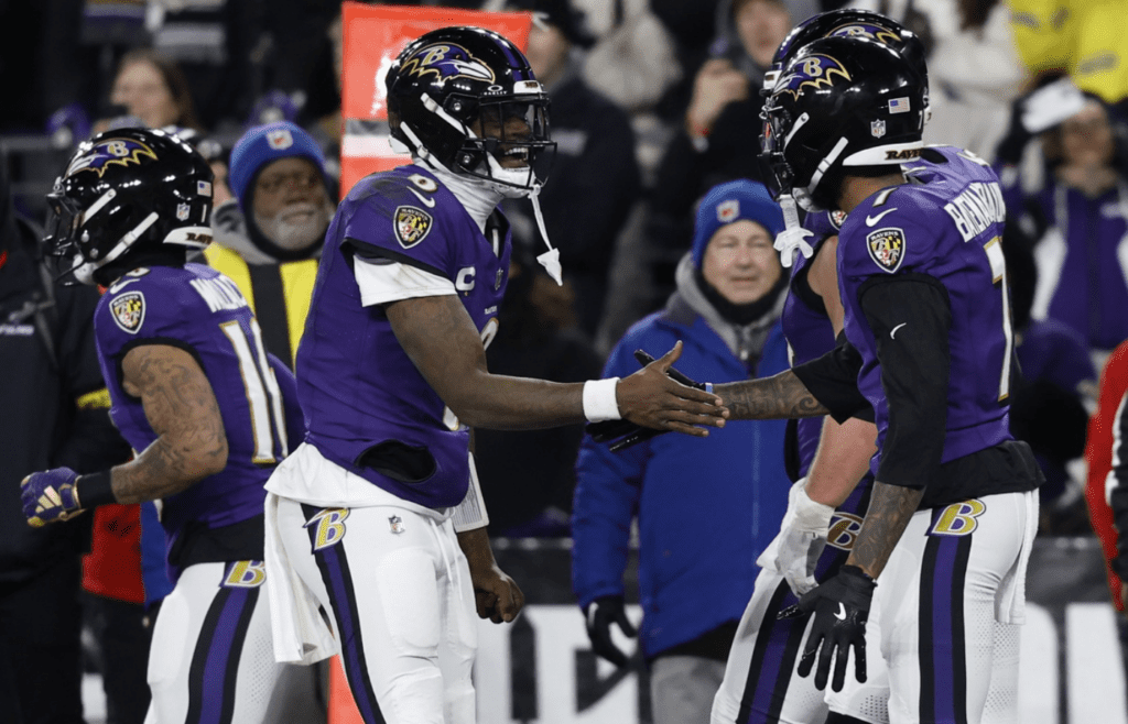 Jan 11, 2025; Baltimore, Maryland, USA; Baltimore Ravens quarterback Lamar Jackson (8) celebrates with Ravens wide receiver Rashod Bateman (7) after connecting on a touchdown pass against the Pittsburgh Steelers in an AFC wild card game at M&T Bank Stadium. Mandatory Credit: Geoff Burke-Imagn Images